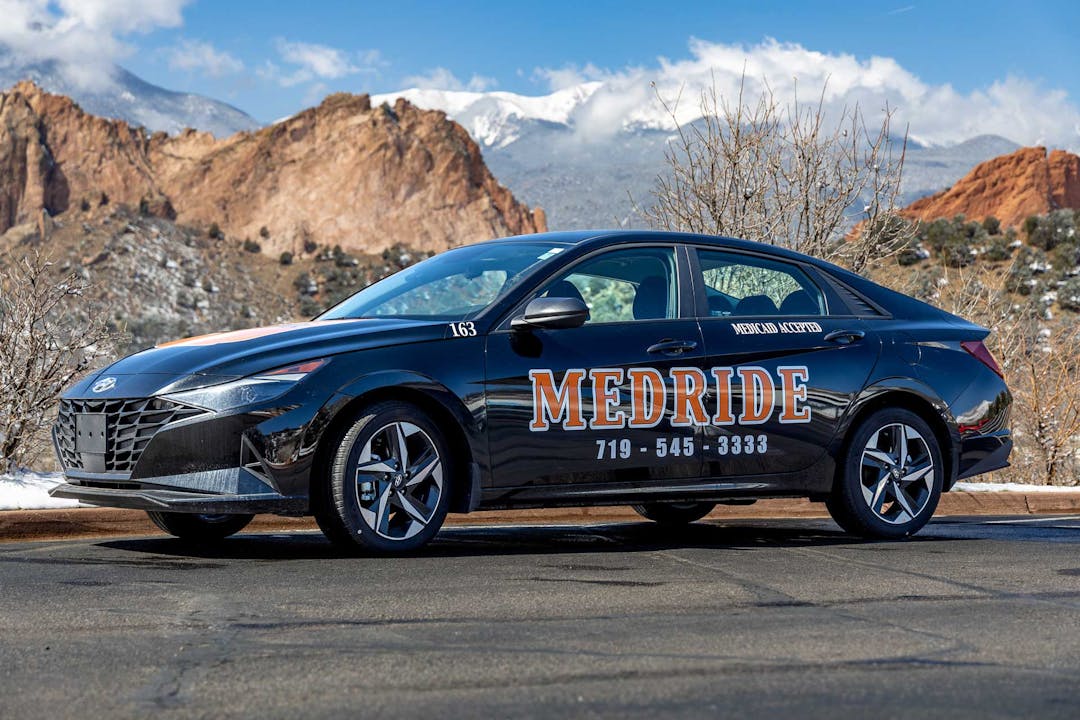 MedRide vehicle driving through the mountains